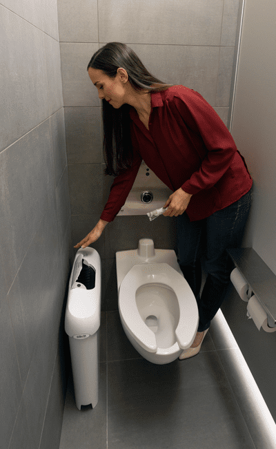 woman disposing tampon