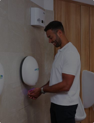 person using citron hand dryer